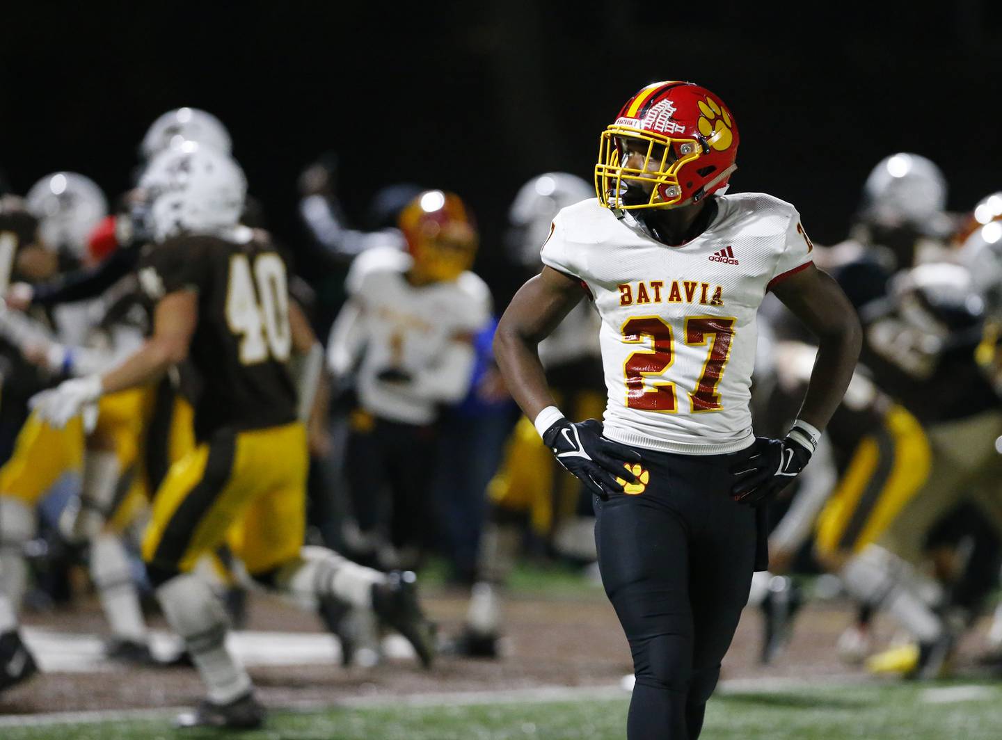 Batavia's Jalen Buckley looks on as fans rush the field as Mt. Carmel wins on a last second touchdown during the IHSA Class 7A  varsity football playoff game between Batavia and Mt. Carmel on Friday, November 5, 2021 in Chicago.