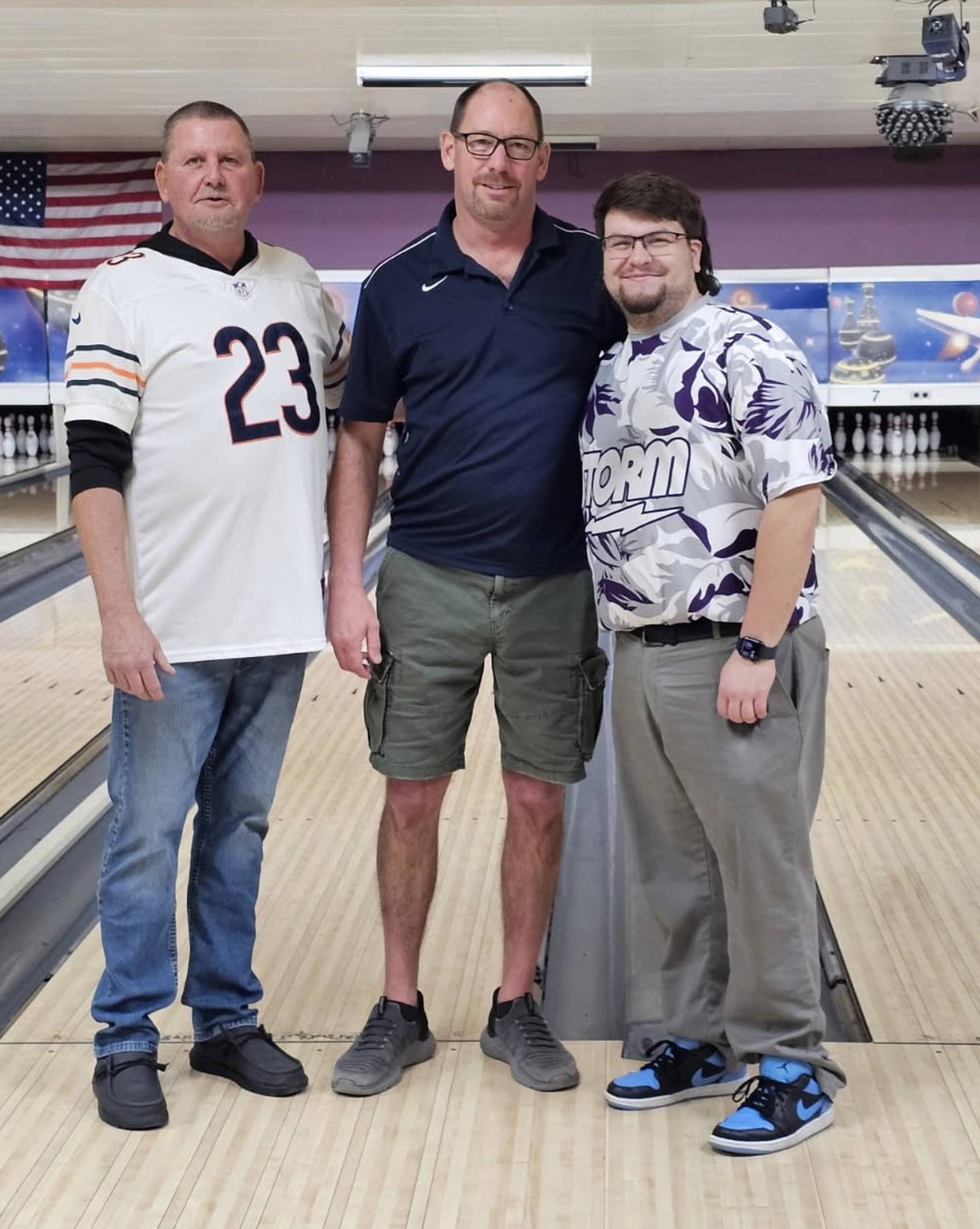 Princeton Bowling Association President Randy Allen (left) presented the 2026 Chuck Putts Memorial Awards to Allen Layton for most pins over average and Trenton Acuncius for highest average in tournament.