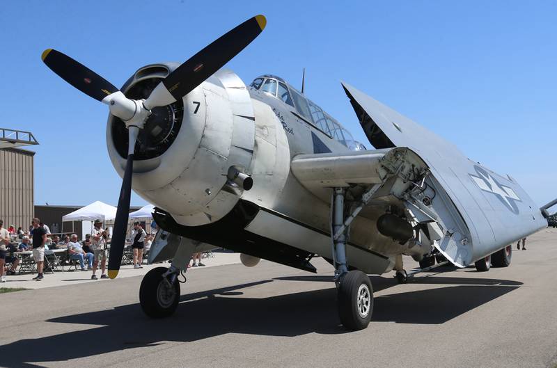 A TBM aircraft passes by the crowd during the 10th annual TBM Avenger Reunion and Airshow on Friday, May 16, 2025 at the Illinois Valley Regional Airport in Peru.