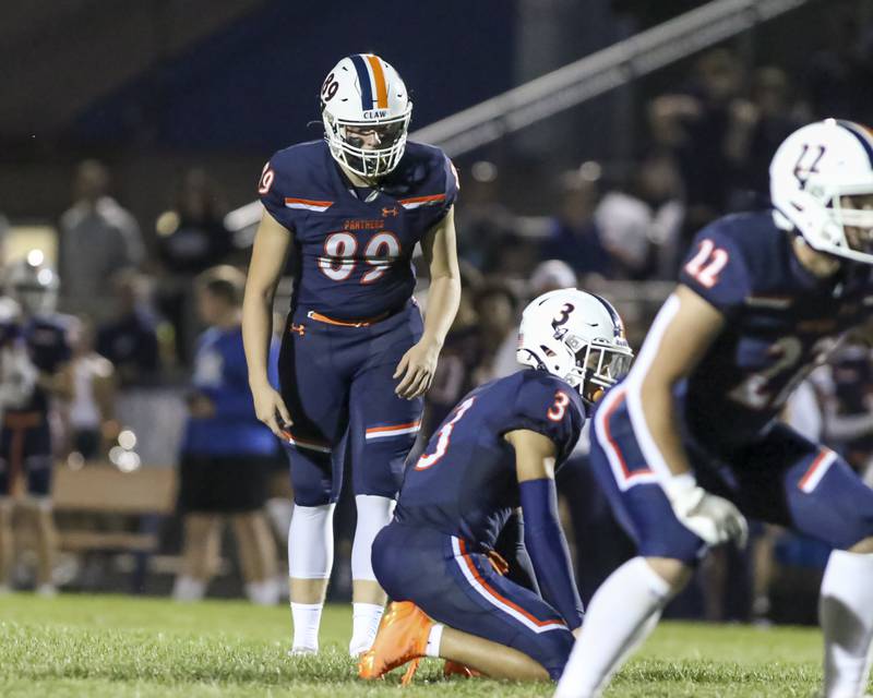 Oswego's Kaleb Stumpenhorst (89) lines up a field goal attempt during football game between Bolingbrook at Oswego Friday, Sept 12, 2025  in Oswego.