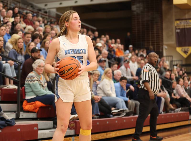 Nazareth's Amalia Dray (25) looks to inbound the ball during the girls 3A varsity super-sectional game between Nazareth Academy and Fenwick High School in River Forest on Monday, Feb. 27, 2023.