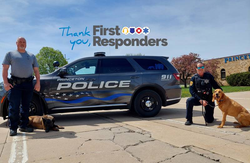 (From left) Princeton officer Erik Sorenson and K9 officer gus pose in front of a police vehicle with officer Sara Rokey and K9 officer Lucy.