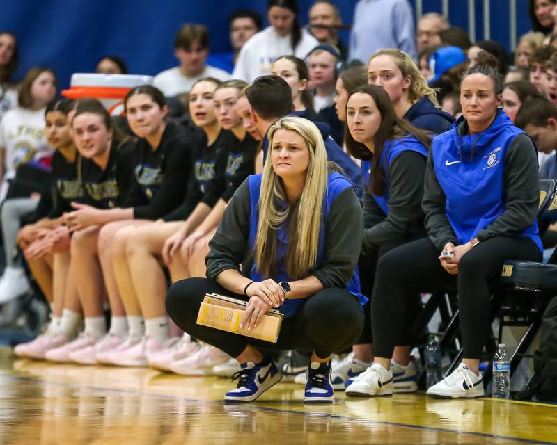 Lyon's head coach Meghan Hutchens watches the team play during their Class 4A Lyons Sectional semifinal basketball game between Lyons vs Young. Feb 25, 2025 in La Grange.