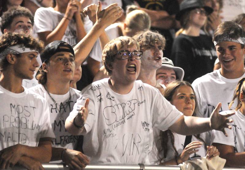 Ottawa fans cheer during the homecoming game against Woodstock North at King Field on Friday, Sept. 29, 2023.