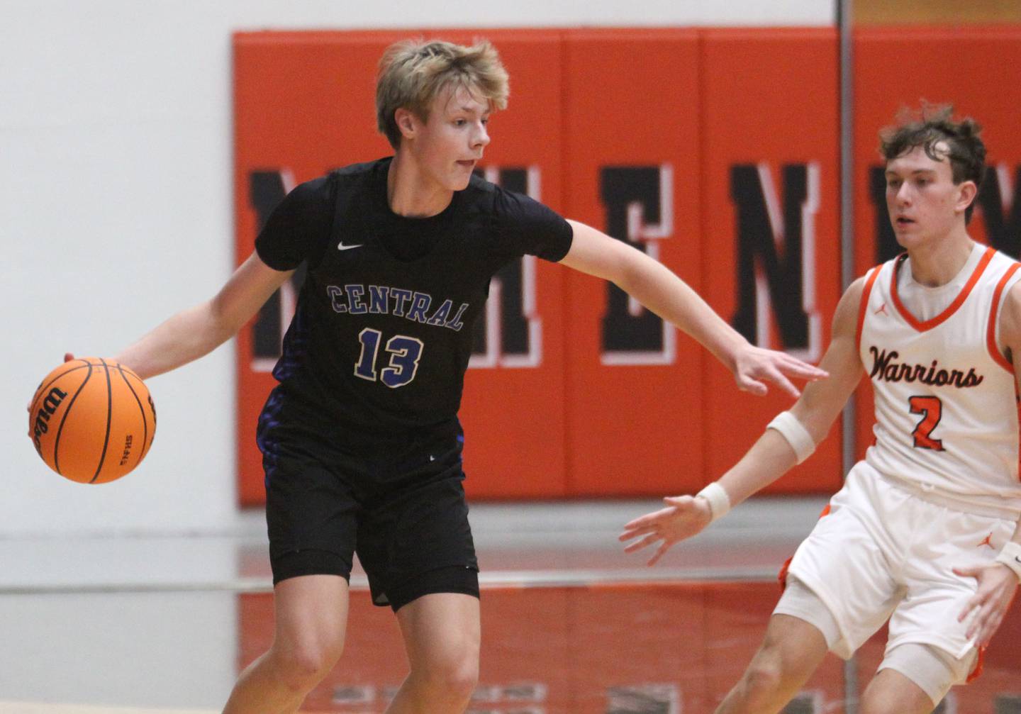 McHenry’s  Dayton Warren, right, follows Burlington Central’s Declan Wilson, left, with the ball in varsity boys basketball on Friday, Dec. 5, 2025, at McHenry Community High School in McHenry.