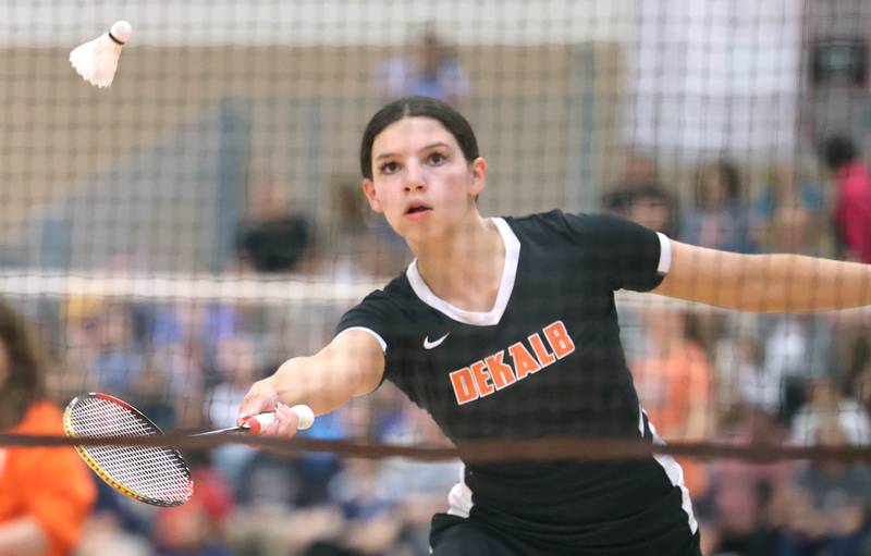 DeKalb’s Gwen Pfile reaches for a shot Friday, May 12, 2023, during her match against  	Carissa Chen from the Illinois Math and Science Academy in the IHSA State Badminton Finals at DeKalb High School.