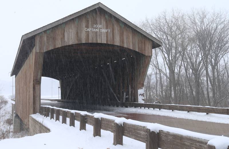 Light snow falls over the Captain Swift bridge on Monday, Dec. 1, 2025 in Princeton.