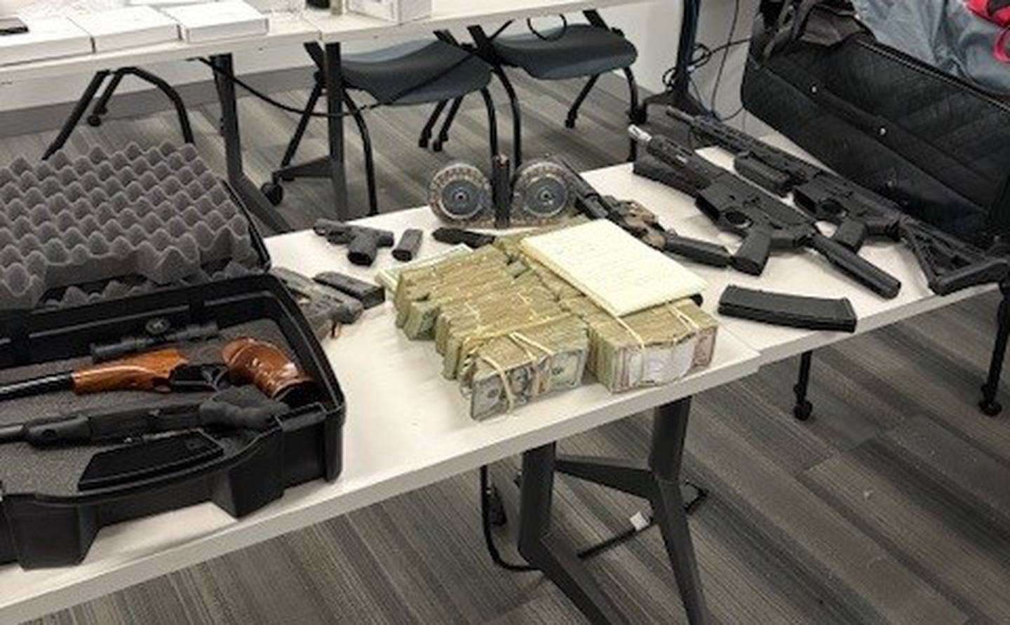 Will County sheriff's deputies found 14 firearms including three AR-15 assault rifles, various calibers of ammunition and numerous firearm magazines, including several with high capacity, while executing a search warrant on a home in the 16500 block of Basil Court in Lockport on Tuesday, March 19, 2025.