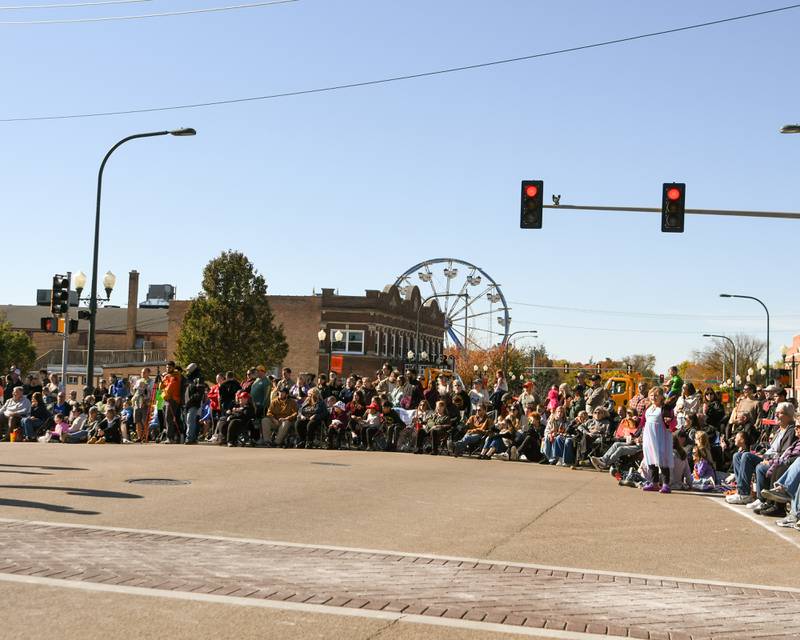 Crowds line the streets for the Pumpkin Parade on Sunday, Oct. 28, 2024, downtown at the 63rd annual Sycamore Pumpkin Festival.
