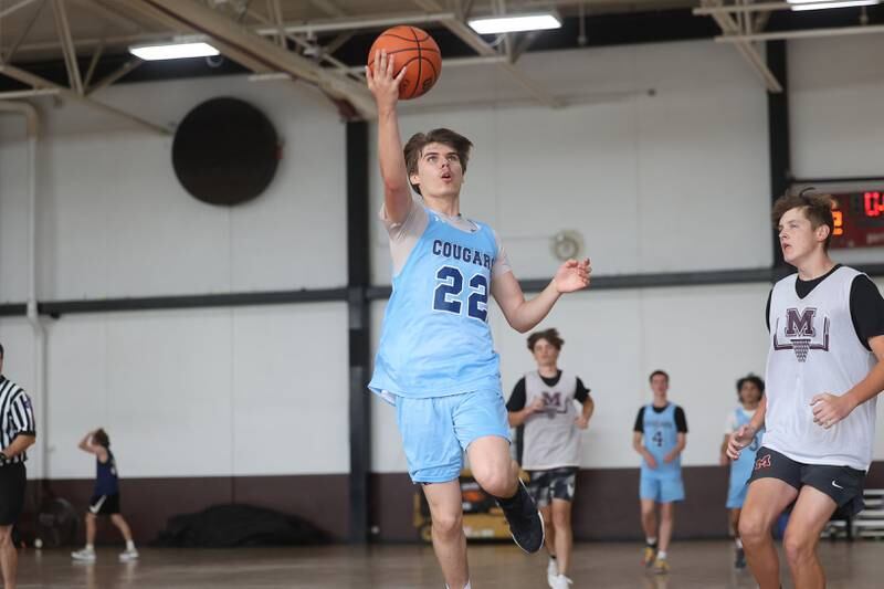 Plainfield South’s Joel Tunatt lays in a shot against Morris at the 37th Morris Boys Shootout on Tuesday, June 25, 2024.