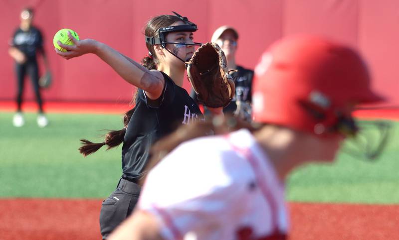 Huntley’s Gretchen Huber fires to first base for an out against Barrington in IHSA Class 4A Sectional Title Game softball action at the Fields of Dreams on the campus of Barrington High School in Barrington on Friday, June 6, 2025.
