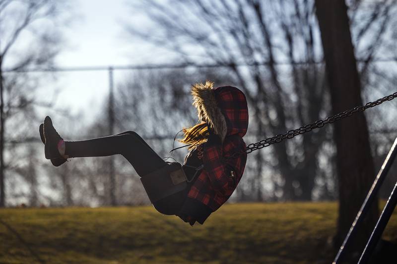 Park connoisseur Bella Daly, 14, of Amboy goes for a swing Monday, Feb. 12, 2024 at EC Smith Park in Dixon. Of all the parks she’s frequented, this is Bella’s favorite according to her mom.