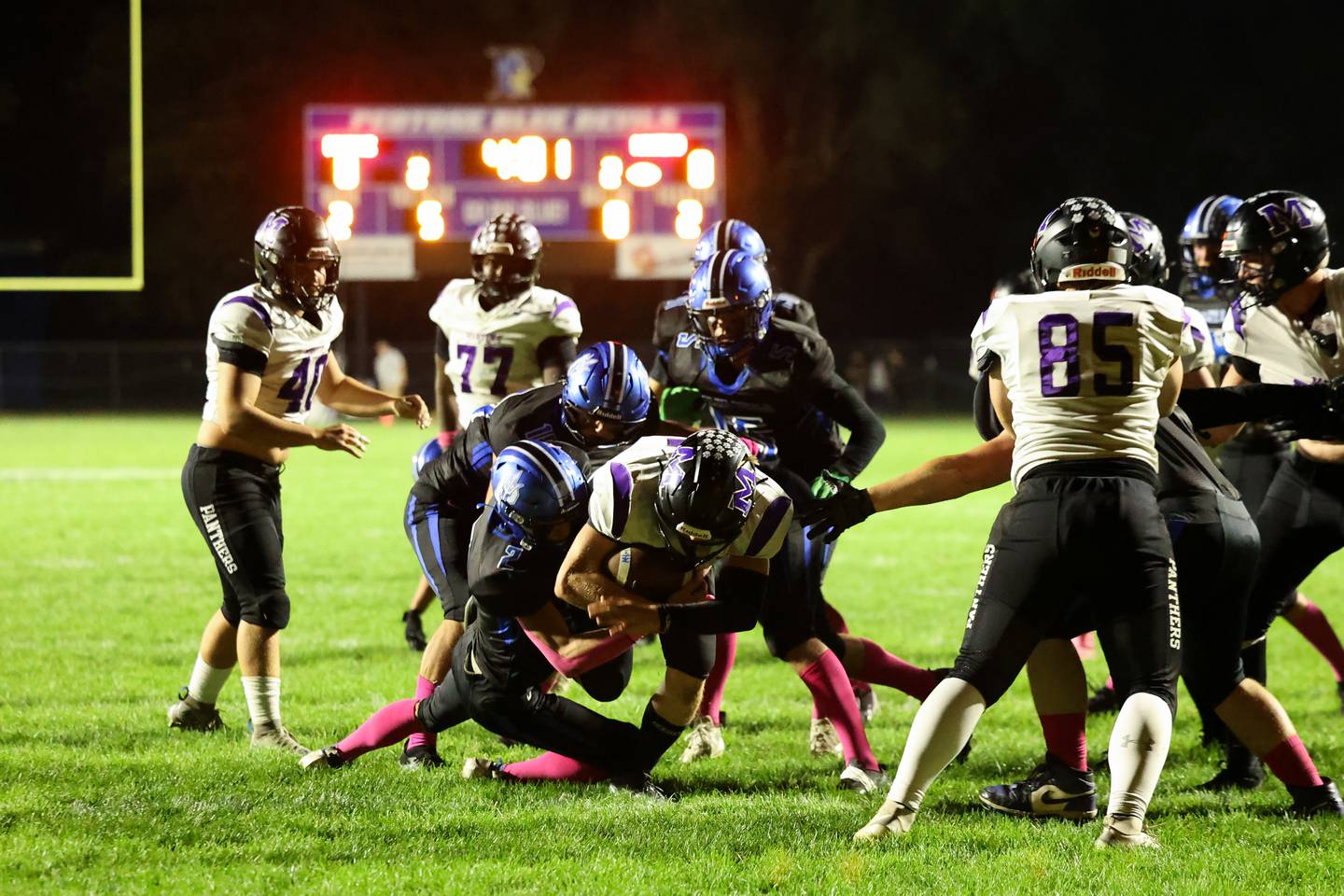Manteno's Nicholas Honkisz gains yardage for a first down as Peotone defenders make the tackle during the Panthers' 25-20 victory over Peotone on Friday, Oct. 17, 2025, in the annual Rumble on Route 50 rivalry game.
