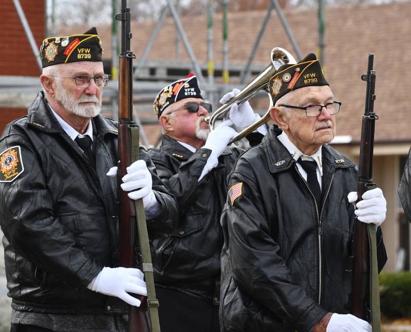 Robert Coulter of the Oregon VFW plays a recording of "Taps" after the gun salute by the Veterans Memorial on the Ogle Couty Courthouse Square on Tuesday, Nov. 11, 2025 to commemorate Veterans Day. The event was one of many held throughout the area.
