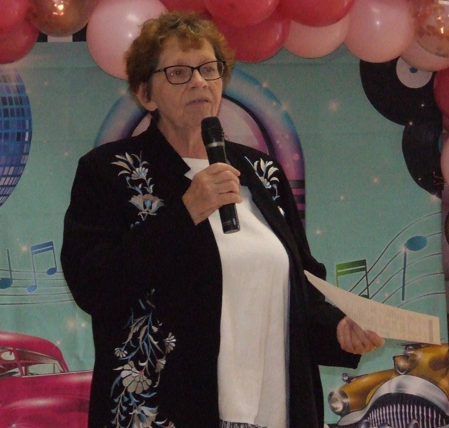 Ellen Rogers, VAC Community Development Director, addressing the crowd to recognize service to people in need