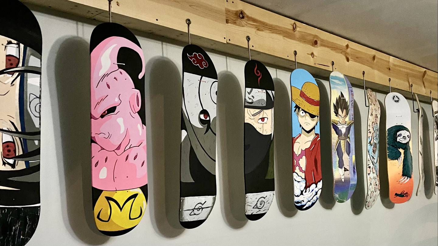 Collection of custom skateboards with anime themes by Francisco "Frankie" Contreras.