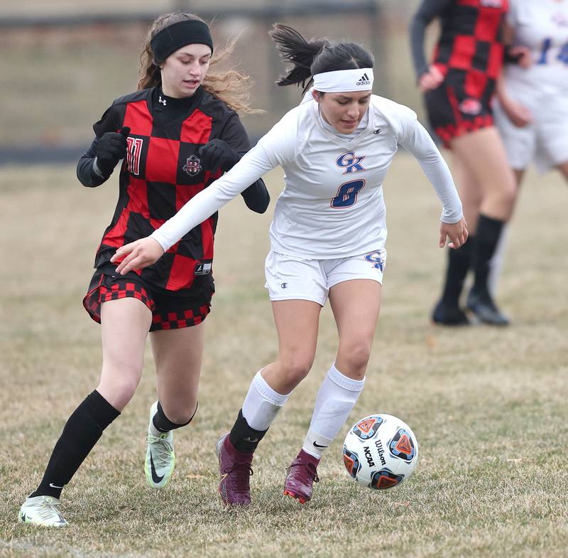 Genoa-Kingston's Anna Martinez (right) tries to hold off Indian Creek's Izzy Turner during their game Thursday, March 16, 2023, at Pack Park Sports Complex in Waterman.