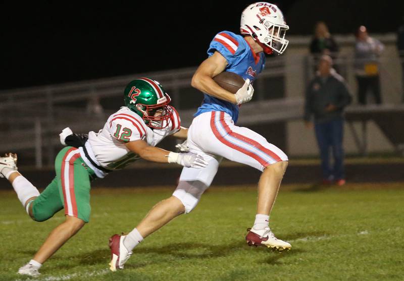 Ottawa's Weston Averkamp gets ahead of L-P's Rylynd Rynkewicz on Friday, Oct. 4, 2024 at King Field.