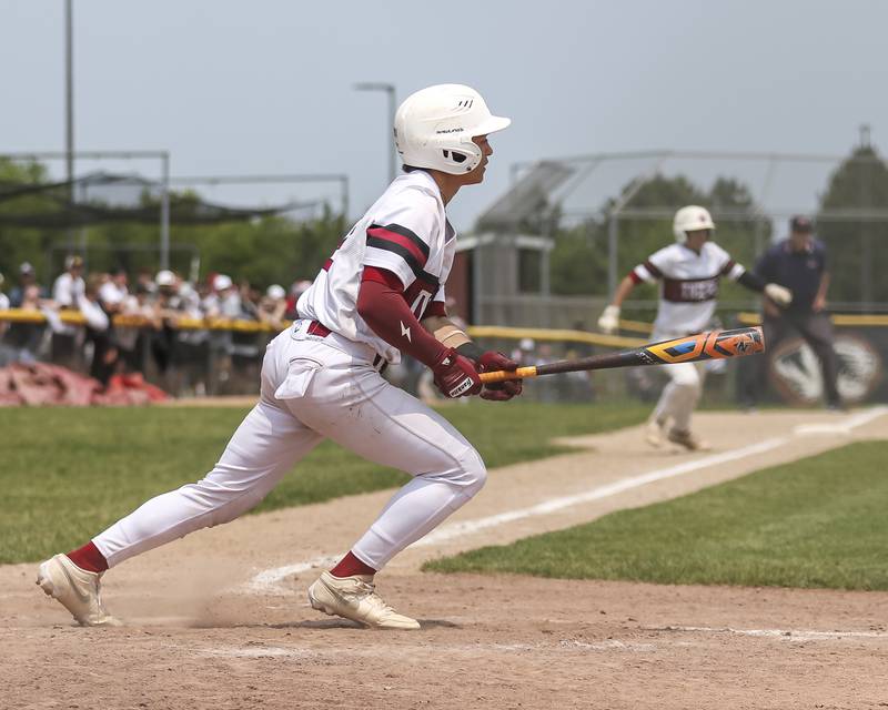 Plainfield North's Luca Agne (12) heads to first after hitting a pitch during Class 4A Plainfield North Regional final baseball game between Oswego at Plainfield North. Saturday, May 31, 2025 in Plainfield.