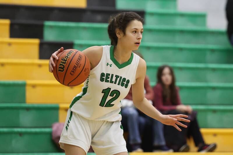 Providence’s Bella Morey looks for a play against IMSA in the Class 3A Providence Regional Semifinal on Tuesday, February 14th.