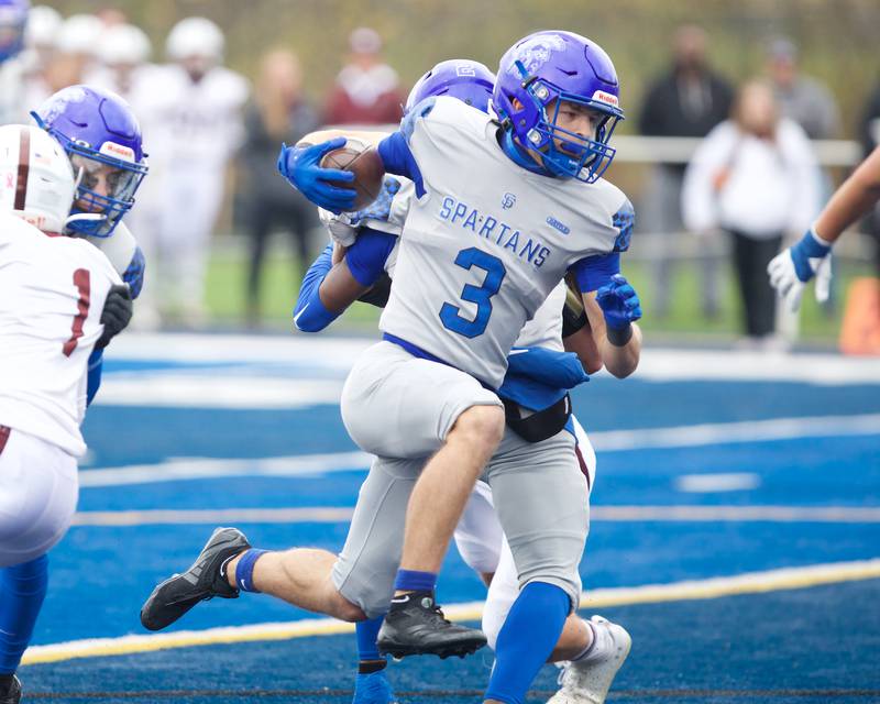 St. Francis Seth Valeri runs the ball for a gain against Prarie Ridge at the Class 5A second-round playoff game on Saturday Nov.9,2024 in Wheaton.