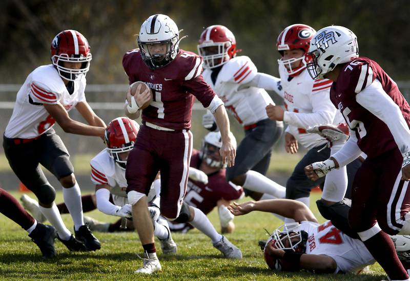 Prairie Ridge's Jack Finn runs through the Chicago Goode defense to score the his first touchdown during an IHSA Class 5A first-round football game on Saturday, Nov. 2, 2024, at Prairie Ridge High School in Crystal Lake.