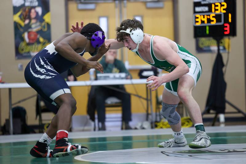 Coal City's Cooper Morris wrestles Chicago Hope Academy's Jeremiah Lawrence in the 132-pound championship match during the IHSA Class 1A Coal City Sectional on Saturday, Feb. 14, 2026.