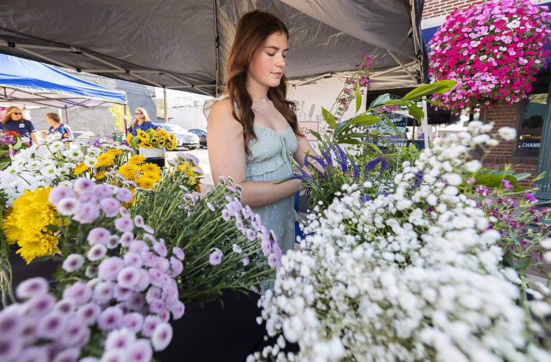 Grace Gates of Rock River Flora makes a fresh cut flower bouquet Wednesday, Aug. 21, 2024, at Dixon City Market. Gates can be reached at rockriverflora on Instagram and Facebook.