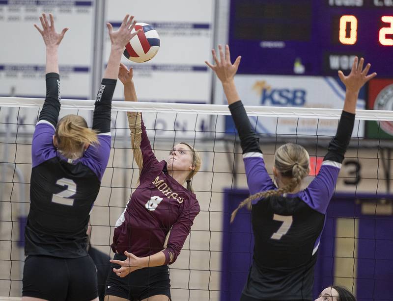 Morris’ Ayla Phillips goes up for a spike against Dixon Thursday, Oct. 31, 2024 in the class 3A regional championship at Dixon High School.