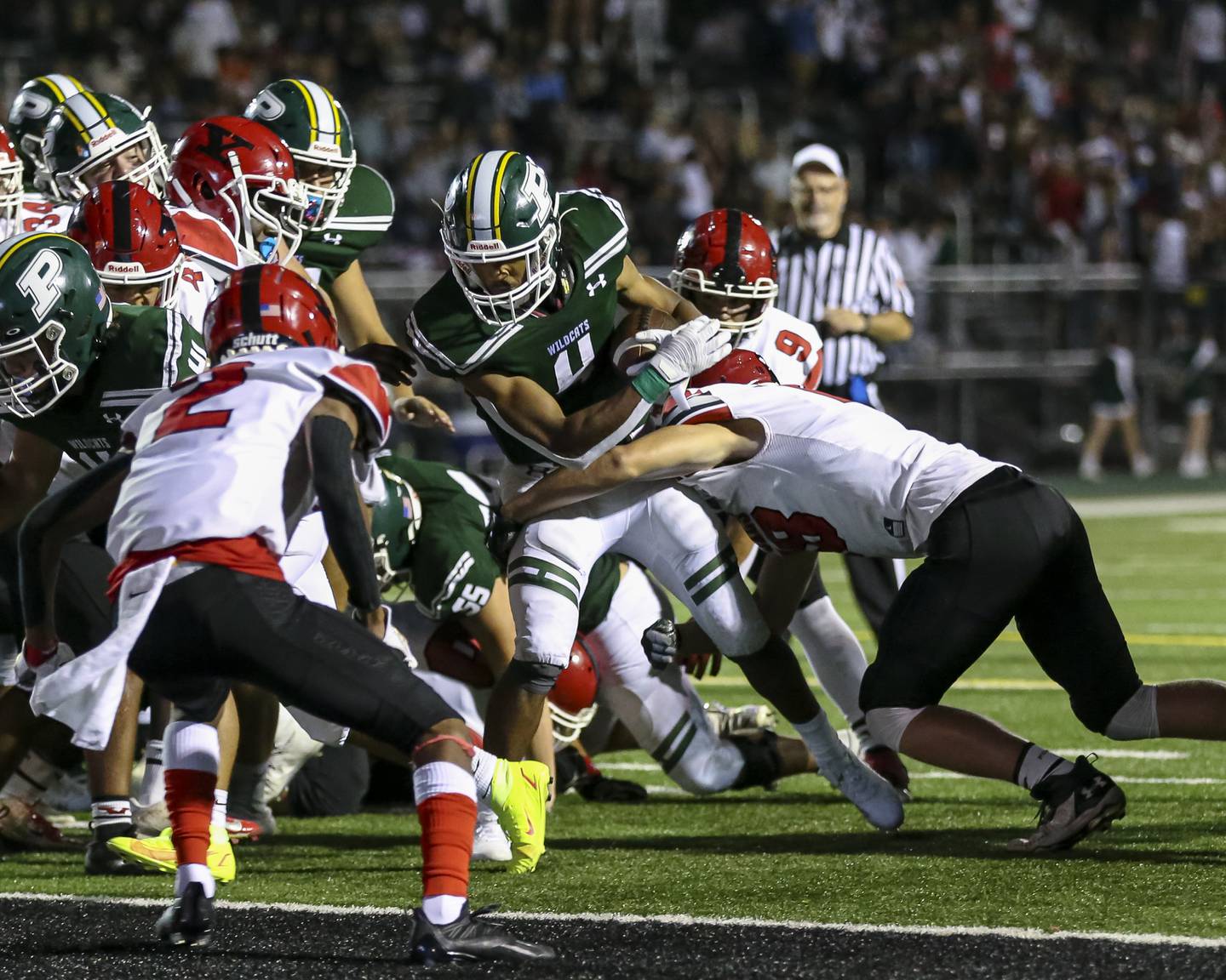 Plainfield Central's Aaron Larkins (4) scores a late touchdown during football game between Plainfield Central vs Yorkville.  Sept 2, 2021.