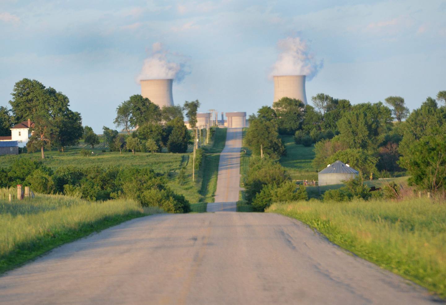 The cooling towers of Exelon's Byron nuclear power plant can be seen in the distance from Mid Town Road, northeast of Mt. Morris.