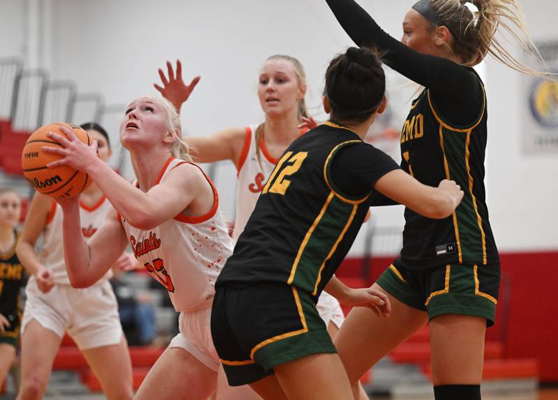 St. Charles East's Addie Schilb shoots against the Fremd defense during the Grow the Game Showcase at Deerfield High School on Saturday, Jan. 3, 2026 in Deerfield.