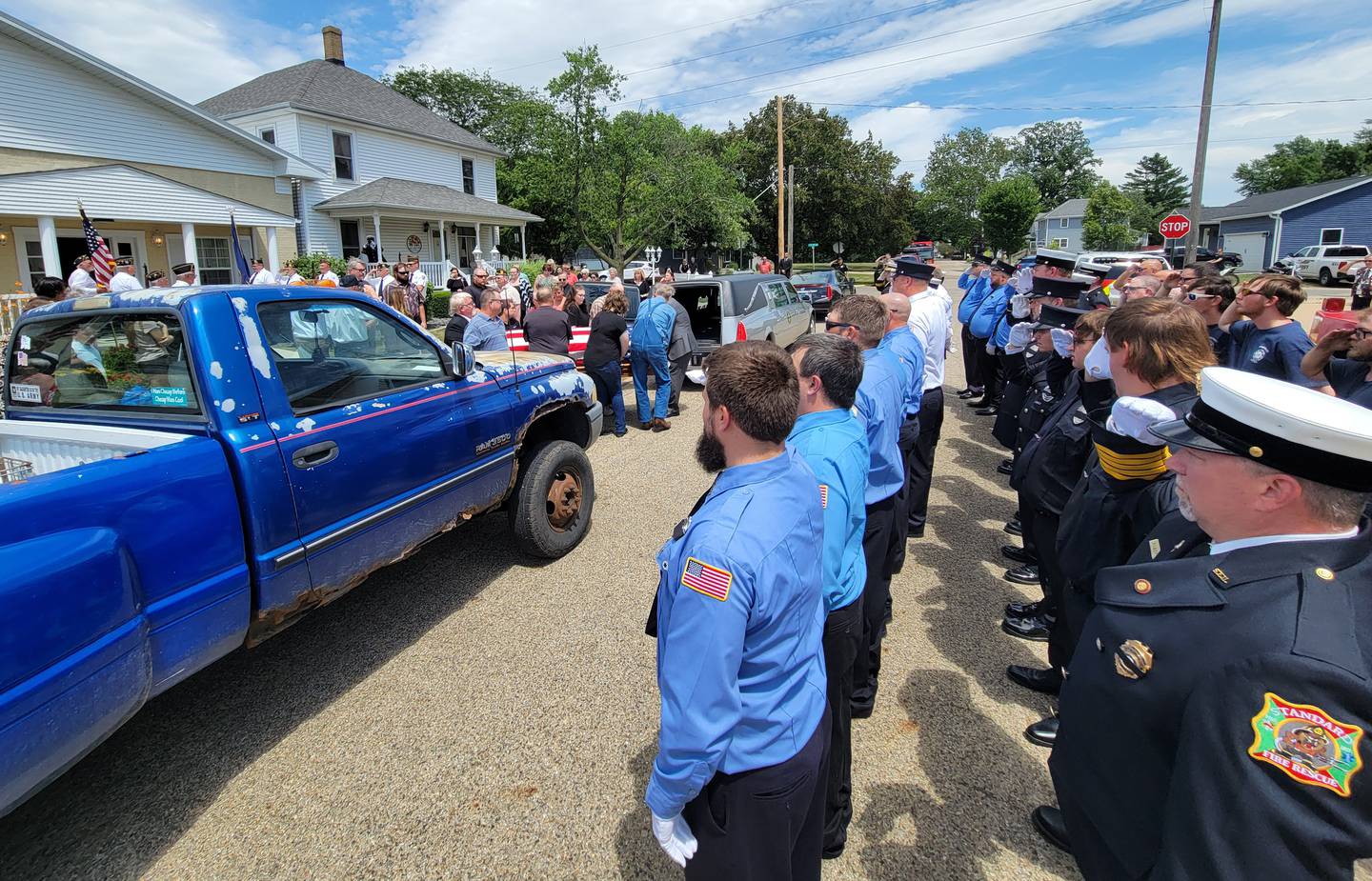 Representatives of dozens of police and fire departments from all over northern Illinois salute in tribute Saturday to the late Arthur Ramey on Saturday in Granville.