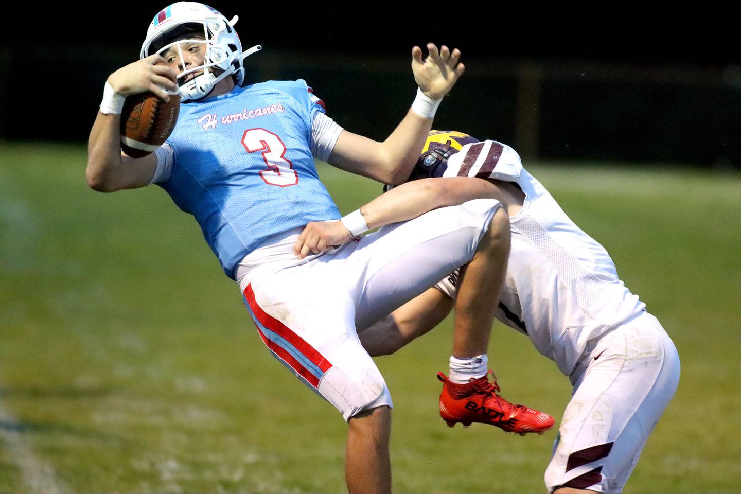 Richmond-Burton’s Blake Livdahl, right, brings down Marian Central’s Colin Hernon in varsity football at George Harding Field on the campus of Marian Central High School in Woodstock on Friday, August 29, 2025.