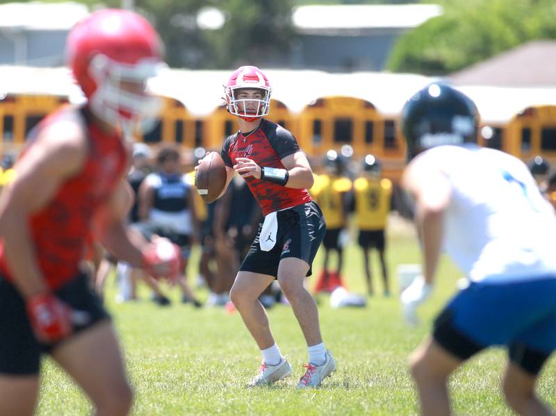 Hinsdale Central quarterback Riley Contreras fires the ball during a 7-on-7 tournament in June 2024 at Naperville North.
