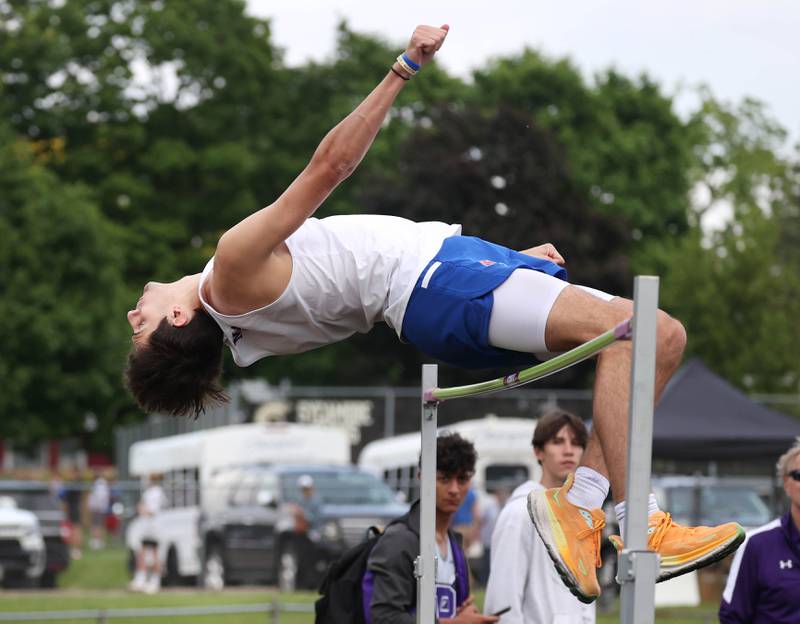 Marmion Academy’s Jonah Augustyn clears the bar in the high jump Thursday, May 16, 2024, during the Class 2A boys track sectional at Sycamore High School.