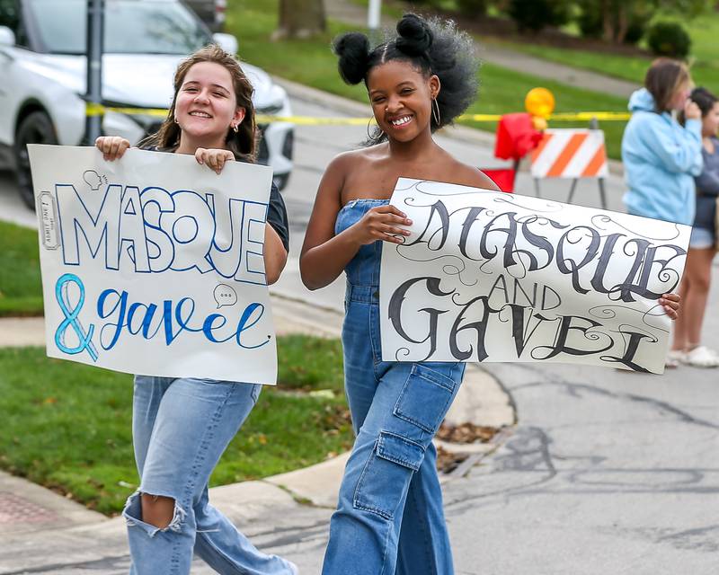 Drama club students march in the Downers Grove South Homecoming Parade. Sept 28, 2024 in Downers Grove.