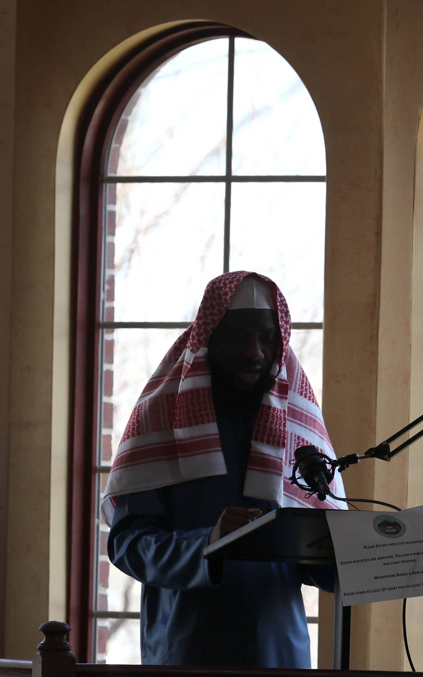 A worship leader speaks Friday, April 7, 2023, in the prayer hall or musallā at the Islamic Center of DeKalb. Muslims are currently observing the holy month of Ramadan.