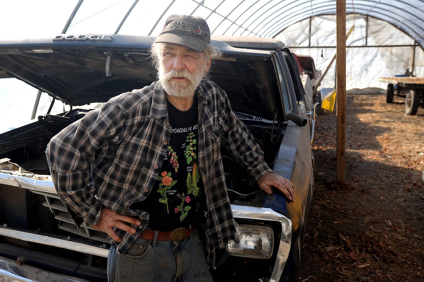 Gary Gauger, 70, takes a break from working on a truck Monday, Feb. 28, 2022, on his farm near Richmond. He was wrongfully convicted in his parents' murder and then exonerated after members of the Outlaw motorcycle gang were named and convicted. One of those bikers was recently denied in his request for compassionate release from prison. Gauger still lives and farms near the property his parents owned and where they were killed.