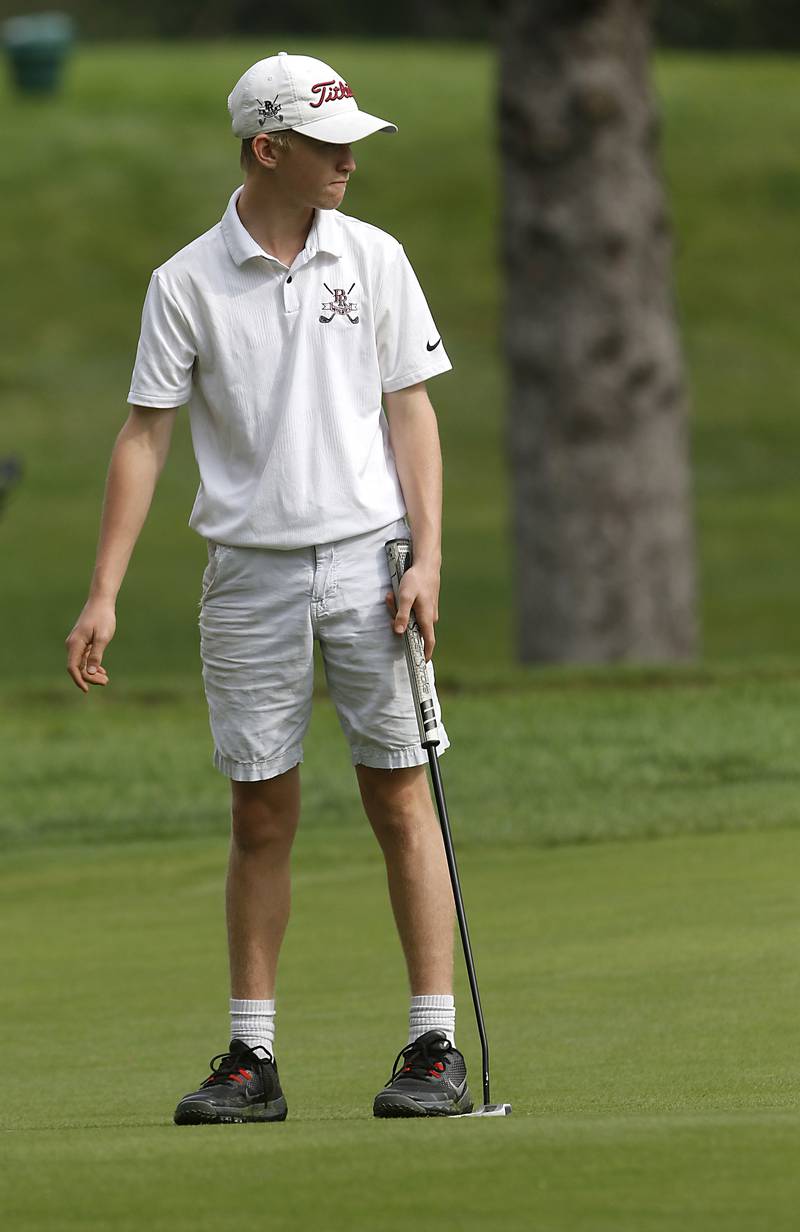 Prairie Ridge’s JJ Lee putts on the seventh green during the Fox Valley Conference Boys Golf Tournament Thursday, Sept. 21, 2023, at McHenry Country Club in McHenry.