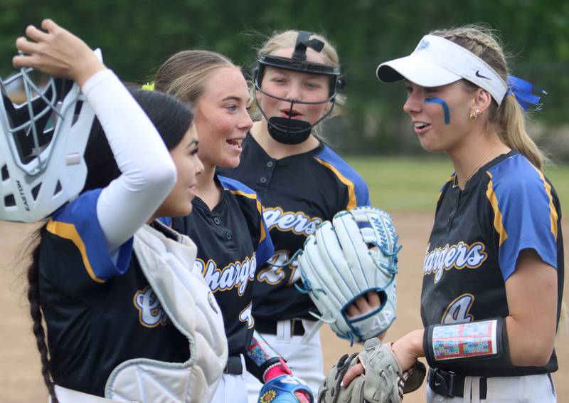 Aurora Central Catholic’s Chargers celebrate a 4-3 win over Marengo in varsity girls softball IHSA Class 2A Regional Title Game action on Friday, May 22, 2026 at Raymond Benoy Field on the campus of Marian Central High School in Woodstock.