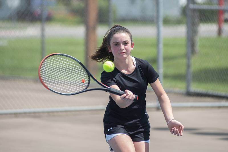 Jenna Mustapha returns a shot while playing in the 11 and under girls singles at the Emma Hubbs tennis classic Thursday, July 26, 2022.