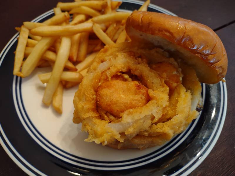 The mac bomb burger at 0-9ers' Pub in Streator has American cheese, mac and cheese bites and an onion ring over a 8-ounce Angus burger.