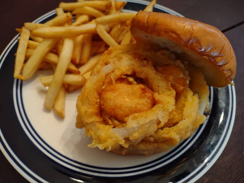 The mac bomb burger at 0-9ers' Pub in Streator has American cheese, mac and cheese bites and an onion ring over a 8-ounce Angus burger.