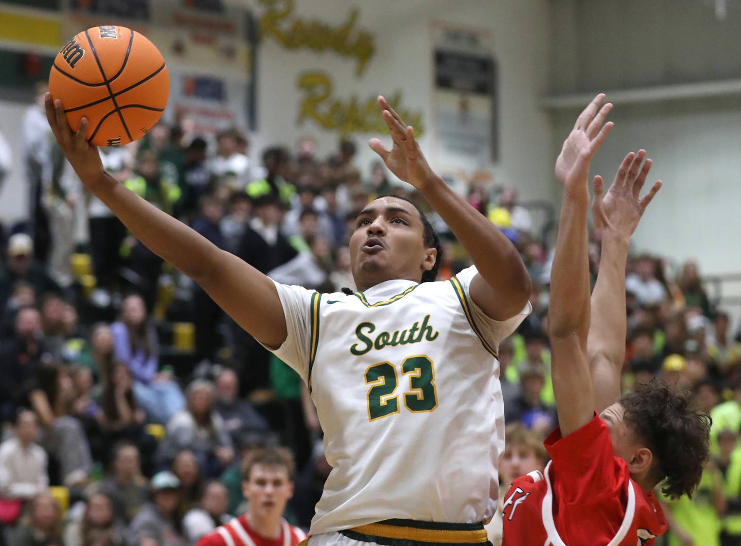 Crystal Lake South's David Mcfadden shot the ball in front of Huntley's Jalen Howard during a Fox Valley Conference boys basketball game on Friday, Jan. 30, 2026, at Crystal Lake South High School.