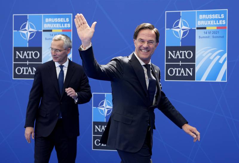 FILE - NATO Secretary General Jens Stoltenberg, left, greets Dutch Prime Minister Mark Rutte during arrivals for a NATO summit at NATO headquarters in Brussels, Monday, June 14, 2021. The United States is the most powerful member of NATO. It spends much more on defense than any other ally and far outweighs its partners in terms of military muscle. NATO's day-to-day work is led by its secretary-general Jens Stoltenberg, until he is replaced on Oct. 1, 2024 by Dutch Prime Minister Mark Rutte. (AP Photo/Francois Mori, Pool, File)