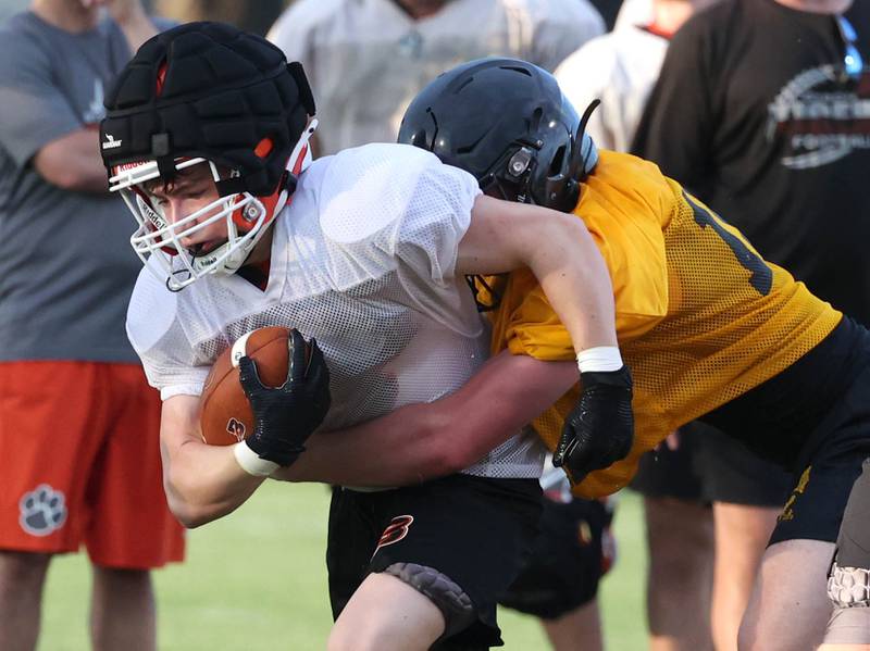 Lena-Winslow and Byron scrimmage Thursday, July 24, 2025, during a joint practice with Byron, Lena-Winslow and Sycamore at Sycamore High School.