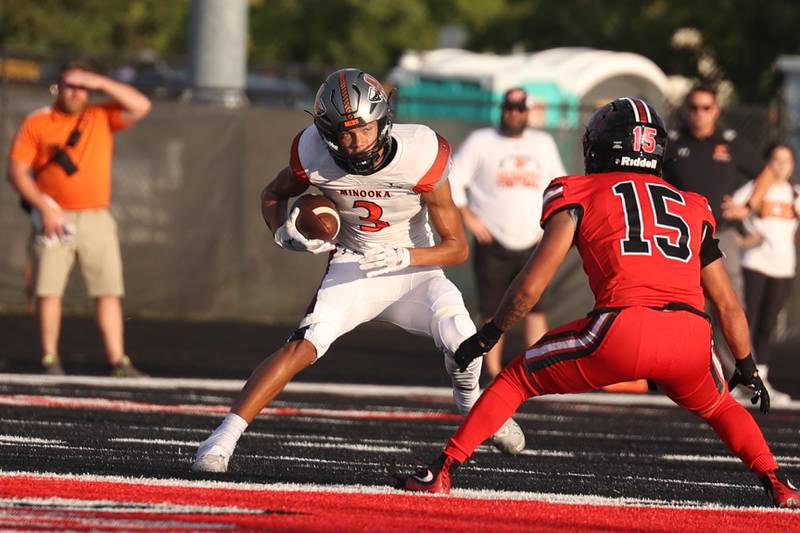 Minooka’s Donovan Anderson makes a move against Bolingbrook. Friday, Aug. 26, 2022, in Bolingbrook.