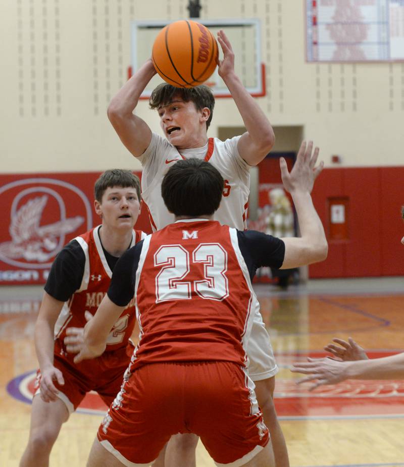 Oregon's Cooper Johnson (3) goes up for the ball against Morrison on Saturday, Jan. 11, 2025 at the Blackhawk Center in Oregon.
