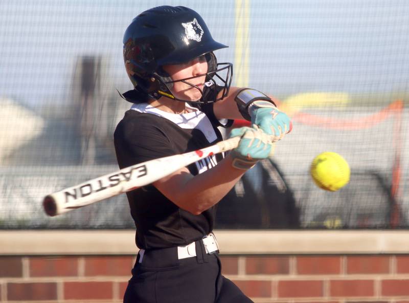 Prairie Ridge’s Ady Kiddy makes contact in varsity softball at Huntley High School in Huntley on Monday, May 5, 2025.